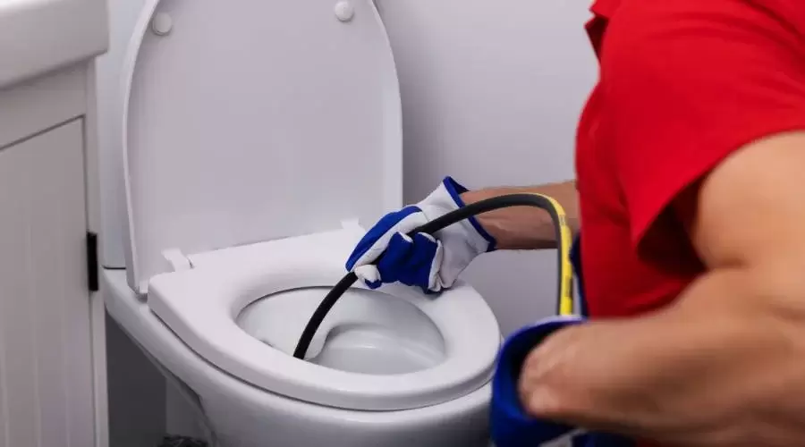 Hydro jetting a toilet