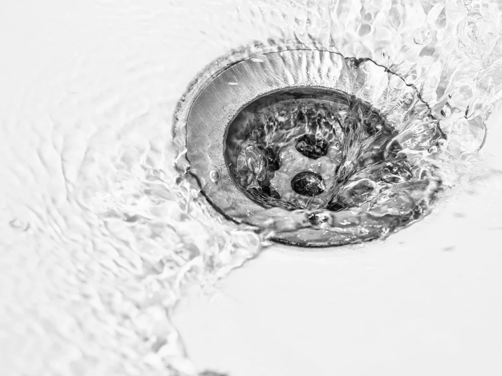 water flowing on a drain